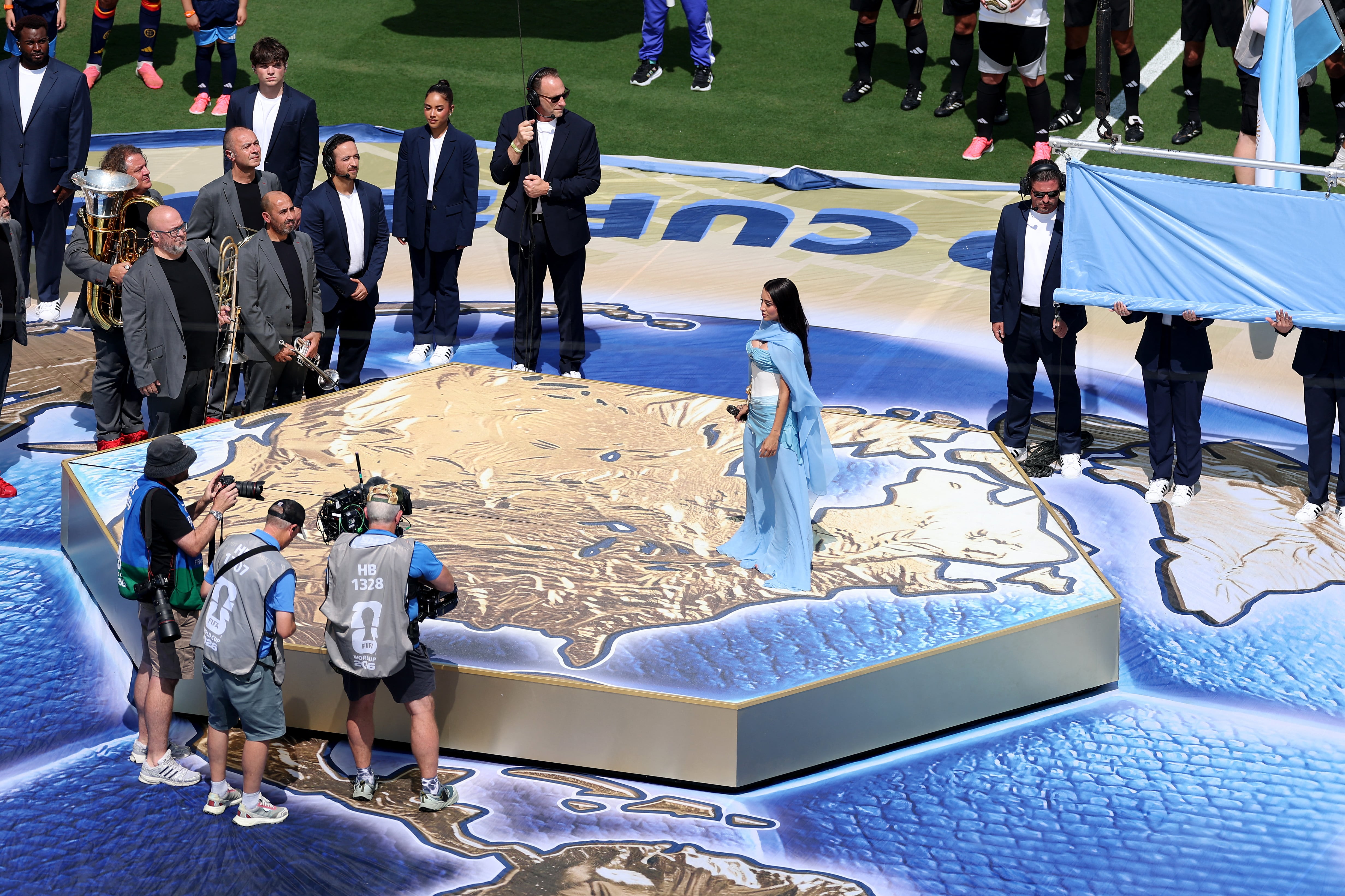 EAST RUTHERFORD, NEW JERSEY - JULY 19: Maria Becerra performs the Argentine national anthem before the FIFA World Cup 2026 Final match between Spain and Argentina at New York New Jersey Stadium on July 19, 2026 in East Rutherford, New Jersey. Florencia Tan Jun/Getty Images/AFP (Photo by Florencia Tan Jun / GETTY IMAGES NORTH AMERICA / Getty Images via AFP)