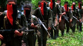 Colombia coordina liberación de dos policías y militar en poder de FARC