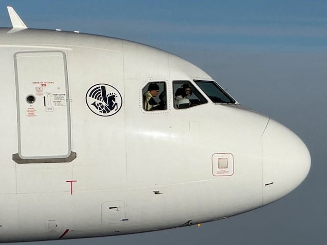 This handout photograph taken on September 28, 2026 and released by France's Armee de l'Air et de l'Espace shows Pope Leo XIV in the cockpit of an Airbus A320 aircraft, flanked by a French Armee de l'Air Rafale fighter jet en route to the Metz�Nancy�Lorraine Airport in Metz, northeastern France, on the last day of th Pope visit to France. Pope Leo XIV spent about 30 minutes in the cockpit of the aircraft that flew him from Lourdes to Metz on September 28, Air France told AFP. (Photo by Handout / Armee de l'Air et de l'Espace francaise / AFP) / RESTRICTED TO EDITORIAL USE - MANDATORY CREDIT "AFP PHOTO / HO / Armee de l'Air et de l'Espace Francaise " - HANDOUT - NO MARKETING NO ADVERTISING CAMPAIGNS - DISTRIBUTED AS A SERVICE TO CLIENTS