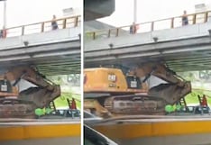 Tráiler con excavadora queda atascado bajo puente de la Vía Expresa y genera caos vehicular en San Borja