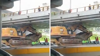 Tráiler con excavadora queda atascado bajo puente de la Vía Expresa y genera caos vehicular en San Borja
