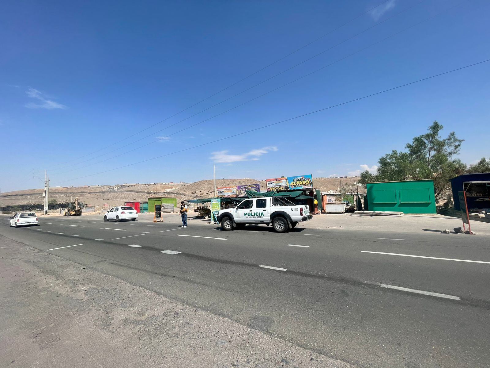 Policías llegaron al lugar donde dispararon al obrero. Foto: Cortesía.