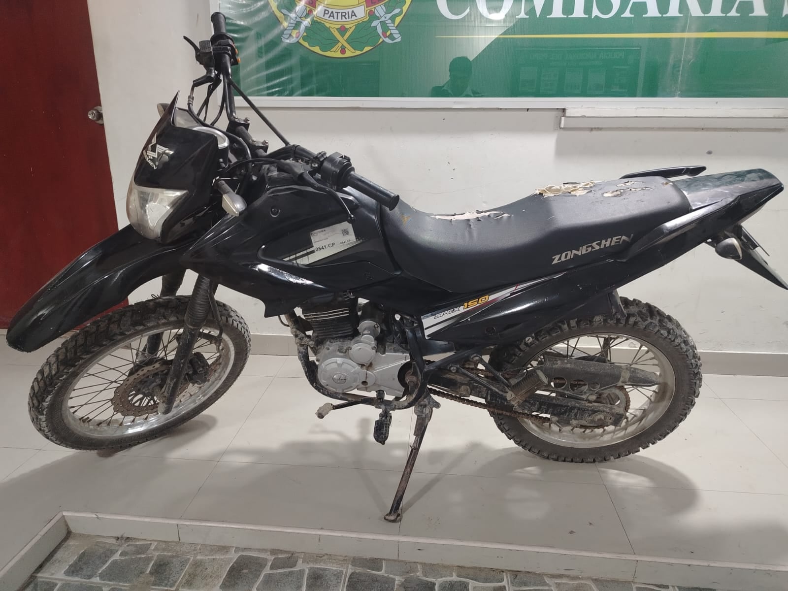 Motocicleta en la que viajaba el ciudadano venezolano.