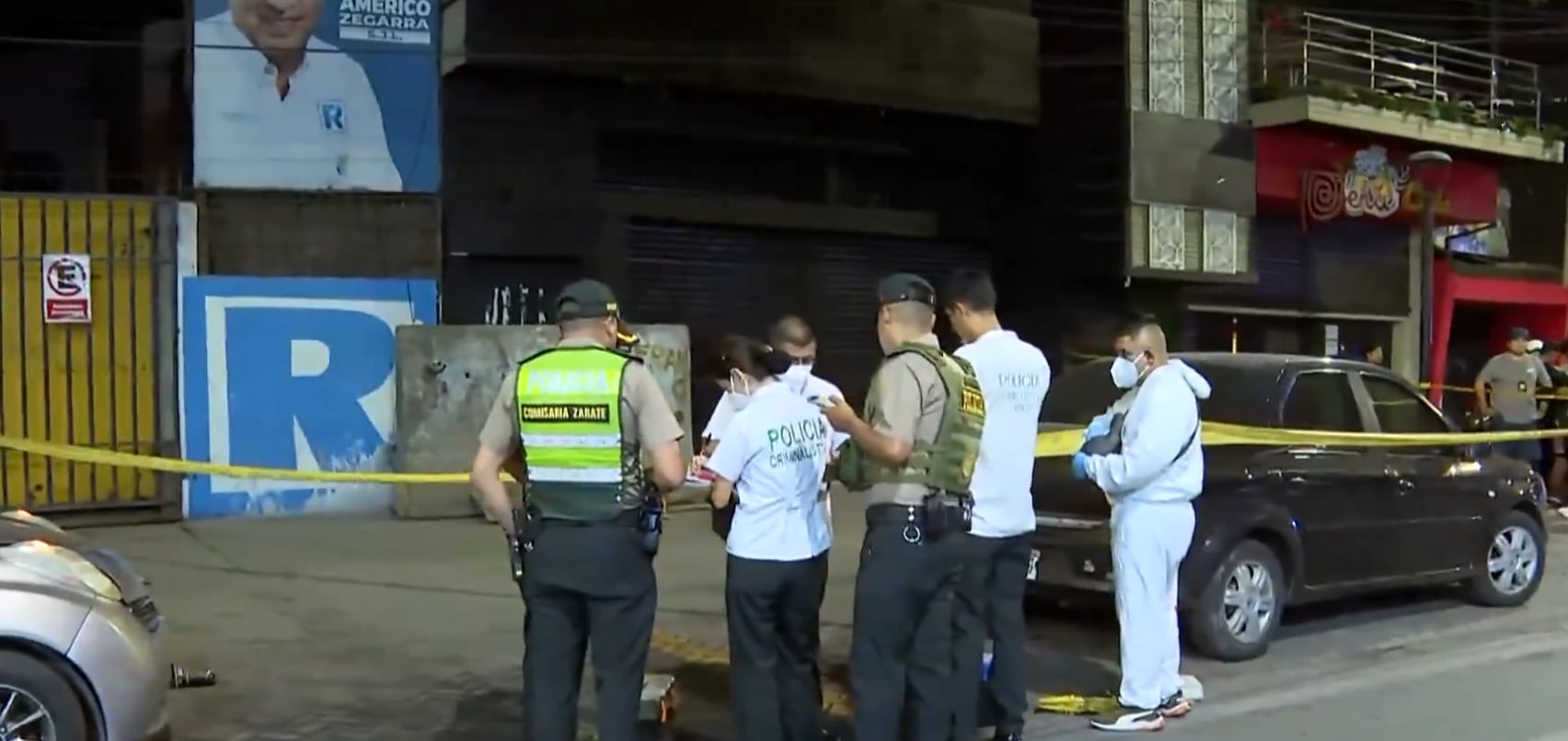 La víctima fue atacada en la puerta de su establecimiento en el jirón Wiracocha. Peritos hallaron al menos 13 casquillos de bala en la escena. (Foto: América Noticias)