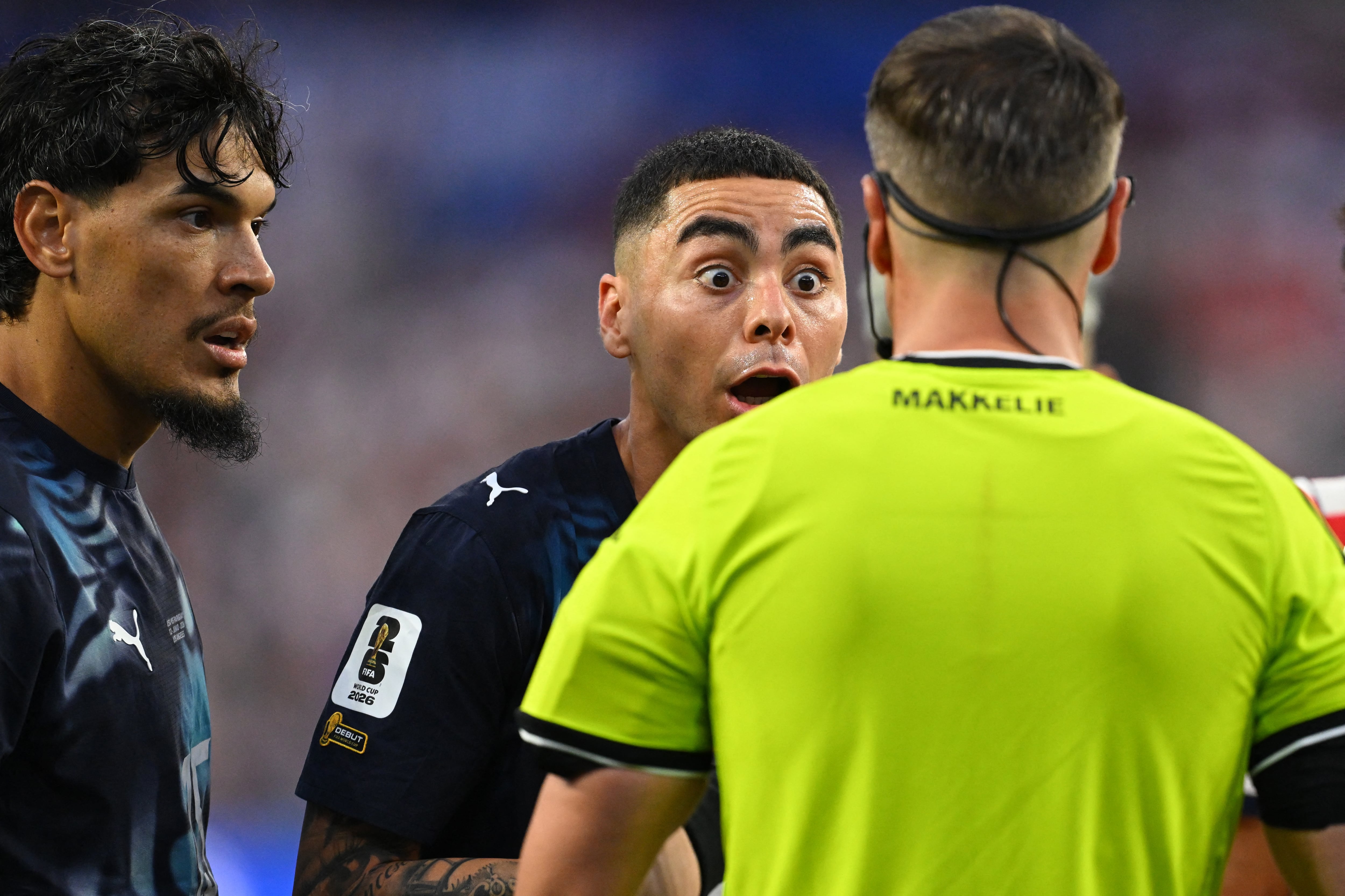 Paraguay's midfielder #10 Miguel Almiron reacts in front of Dutch referee Danny Makkelie during the 2026 World Cup Group D football match between USA and Paraguay at the Los Angeles Stadium in Inglewood on June 12, 2026. (Photo by Patrick T. Fallon / AFP)
