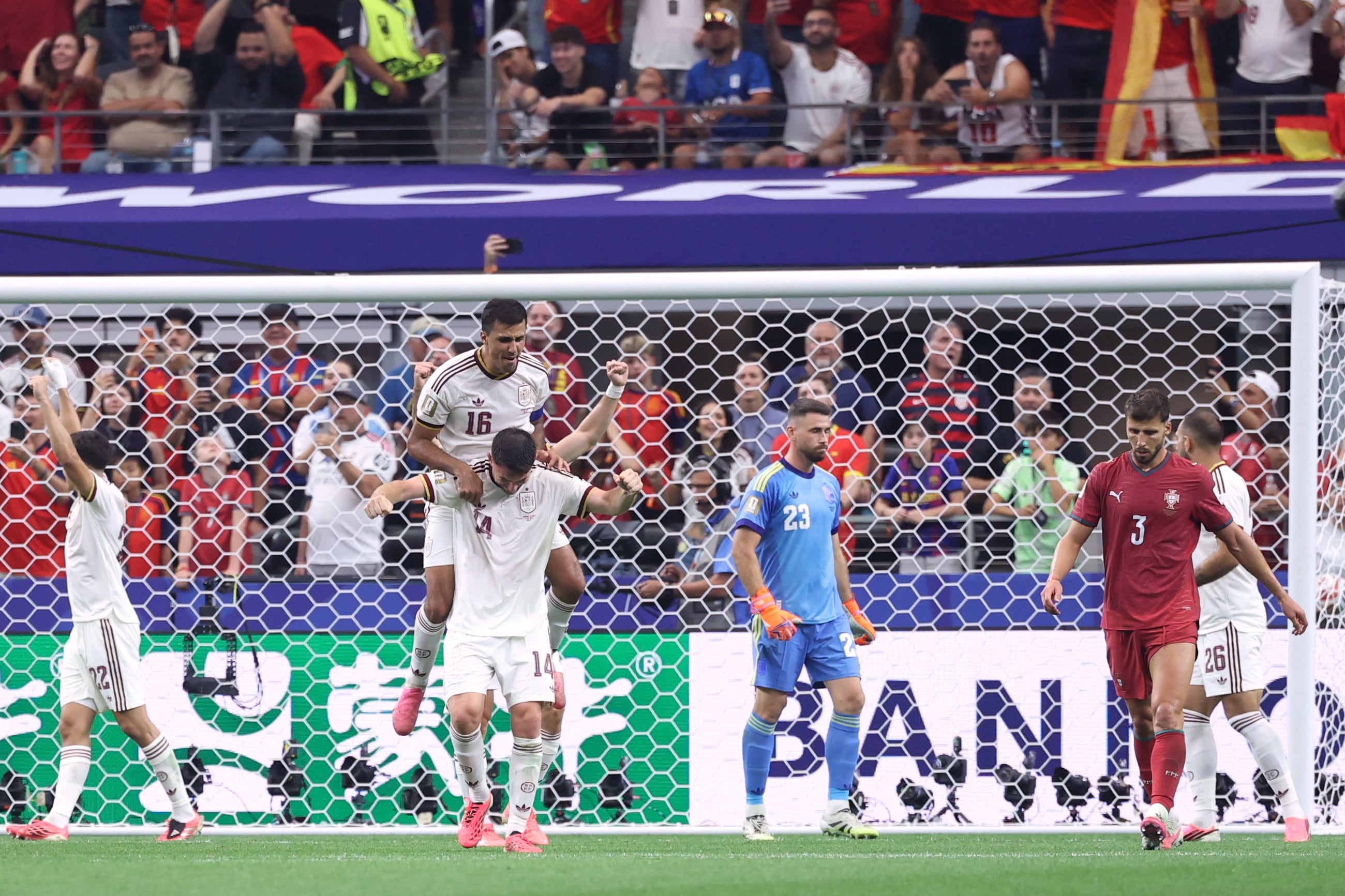 Spain's midfielder #16 Rodri and defender #14 Aymeric Laporte react after winning the 2026 World Cup round of 16 football match between Portugal and Spain at the Dallas Stadium in Arlington on July 6, 2026. (Photo by Thomas COEX / AFP)