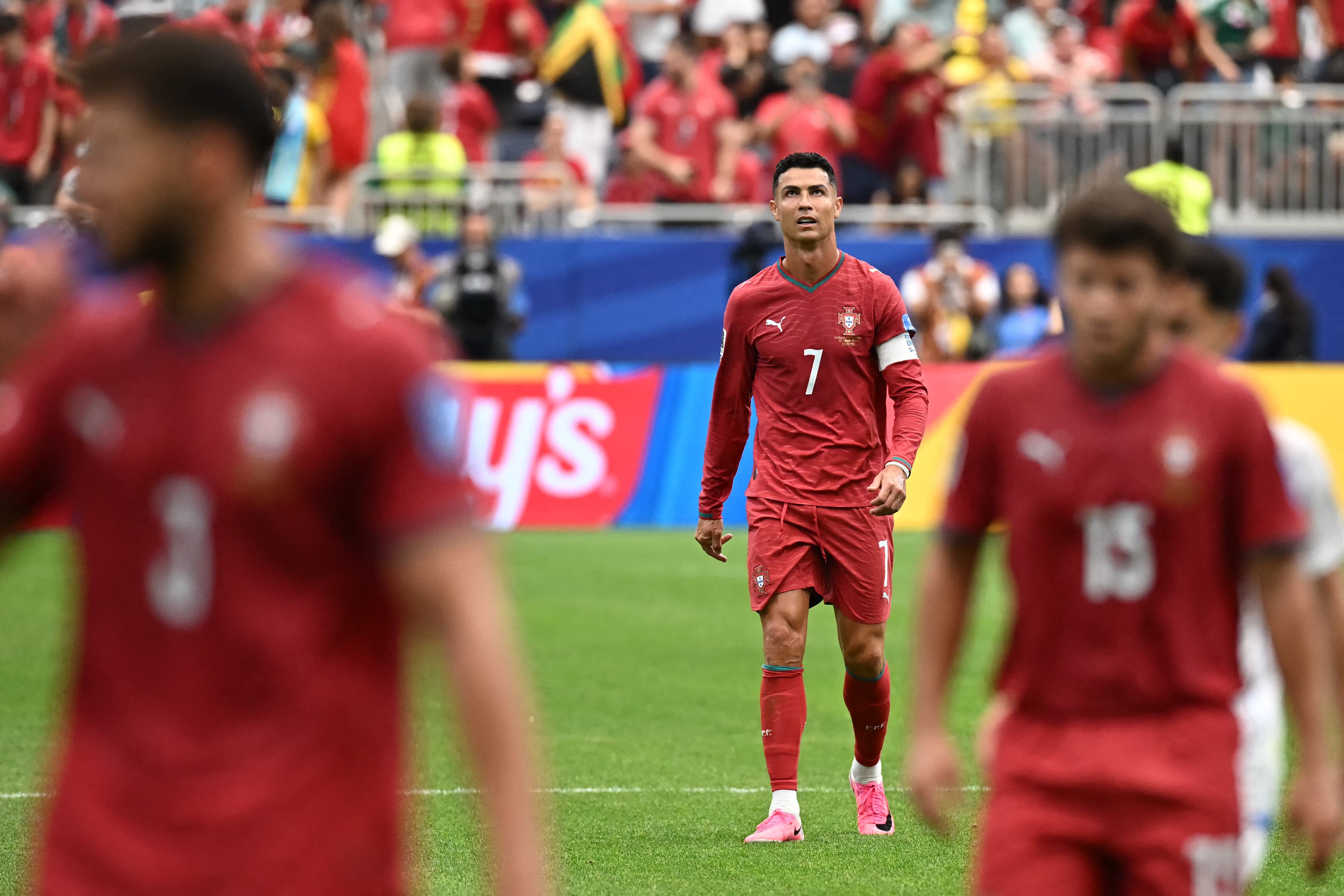 Portugal's forward #07 Cristiano Ronaldo leaves the pitch at half-time of the 2026 World Cup Group K football match between Portugal and Uzbekistan at the Houston Stadium in Houston on June 23, 2026. (Photo by Paul ELLIS / AFP)