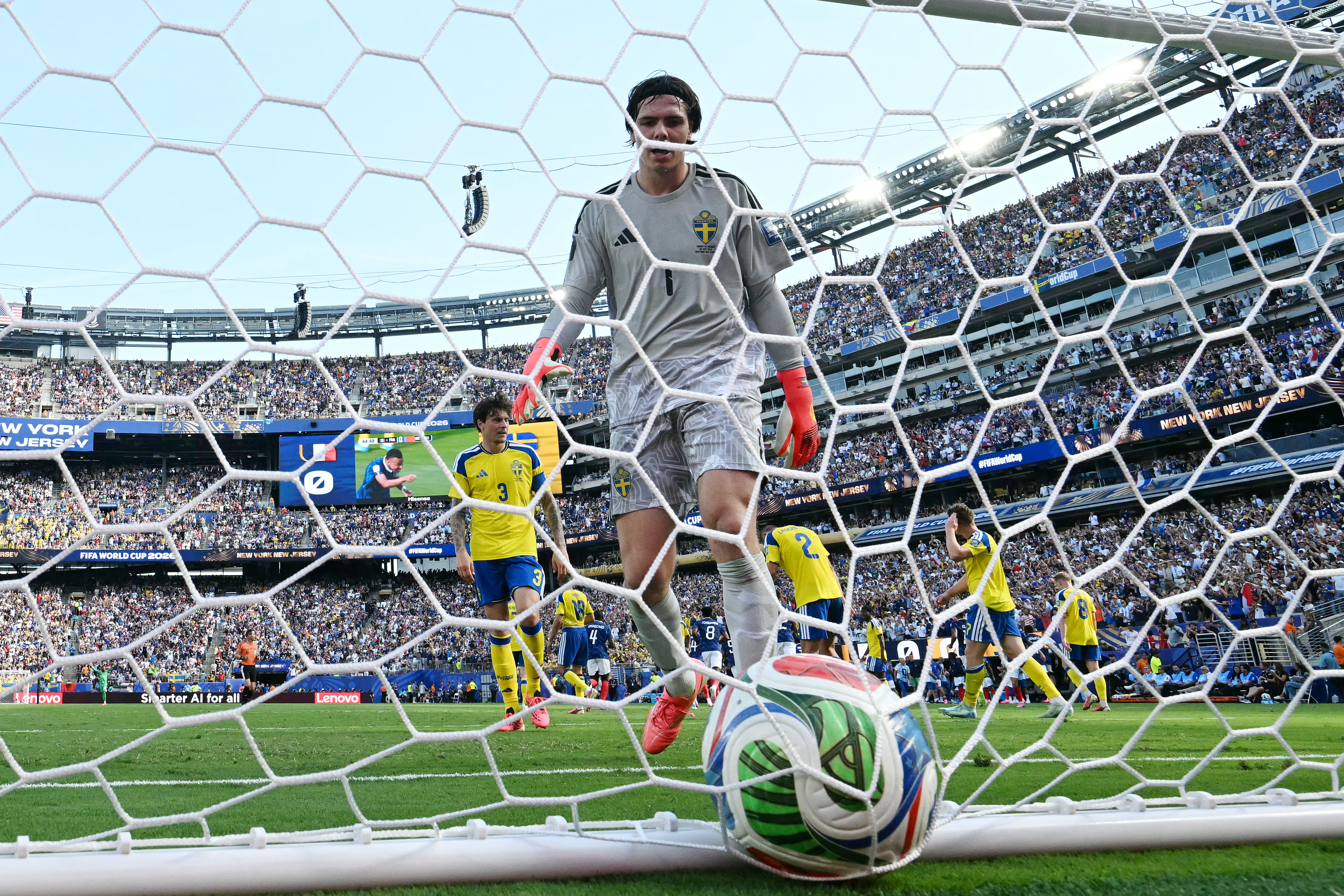 Sweden's goalkeeper #01 Jacob Widell Zetterstrom looks at the ball after conceding France's first goal scored by forward #10 Kylian Mbappe (unseen) during the 2026 World Cup round of 32 football match between France and Sweden at the New York/New Jersey Stadium in East Rutherford on June 30, 2026. (Photo by Jewel SAMAD / AFP)