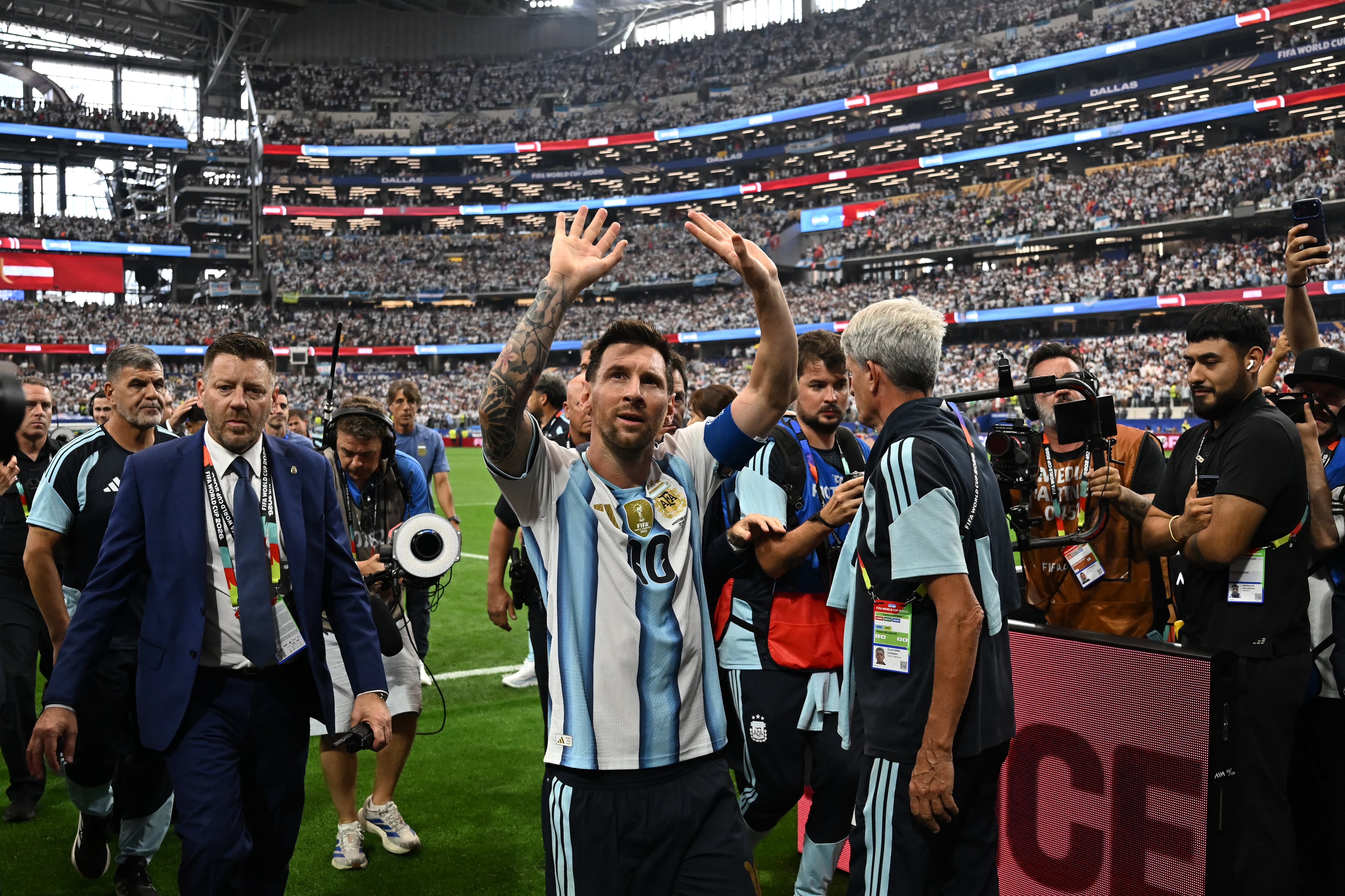 Argentina's forward #10 Lionel Messi waves as he leaves the pitch after winning the 2026 World Cup Group J football match between Argentina and Austria at the Dallas Stadium in Arlington on June 22, 2026. (Photo by Paul ELLIS / AFP)