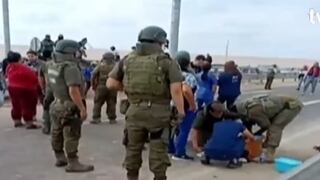 Migrantes toman la Panamericana Sur por 6 horas y atacan a la Policía