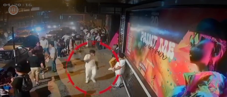 Las autoridades buscan mejorar la calidad de los videos de seguridad para identificar a un hombre con casaca ploma y su acompañante implicados en el crimen. (Captura de imagen de América Noticias)