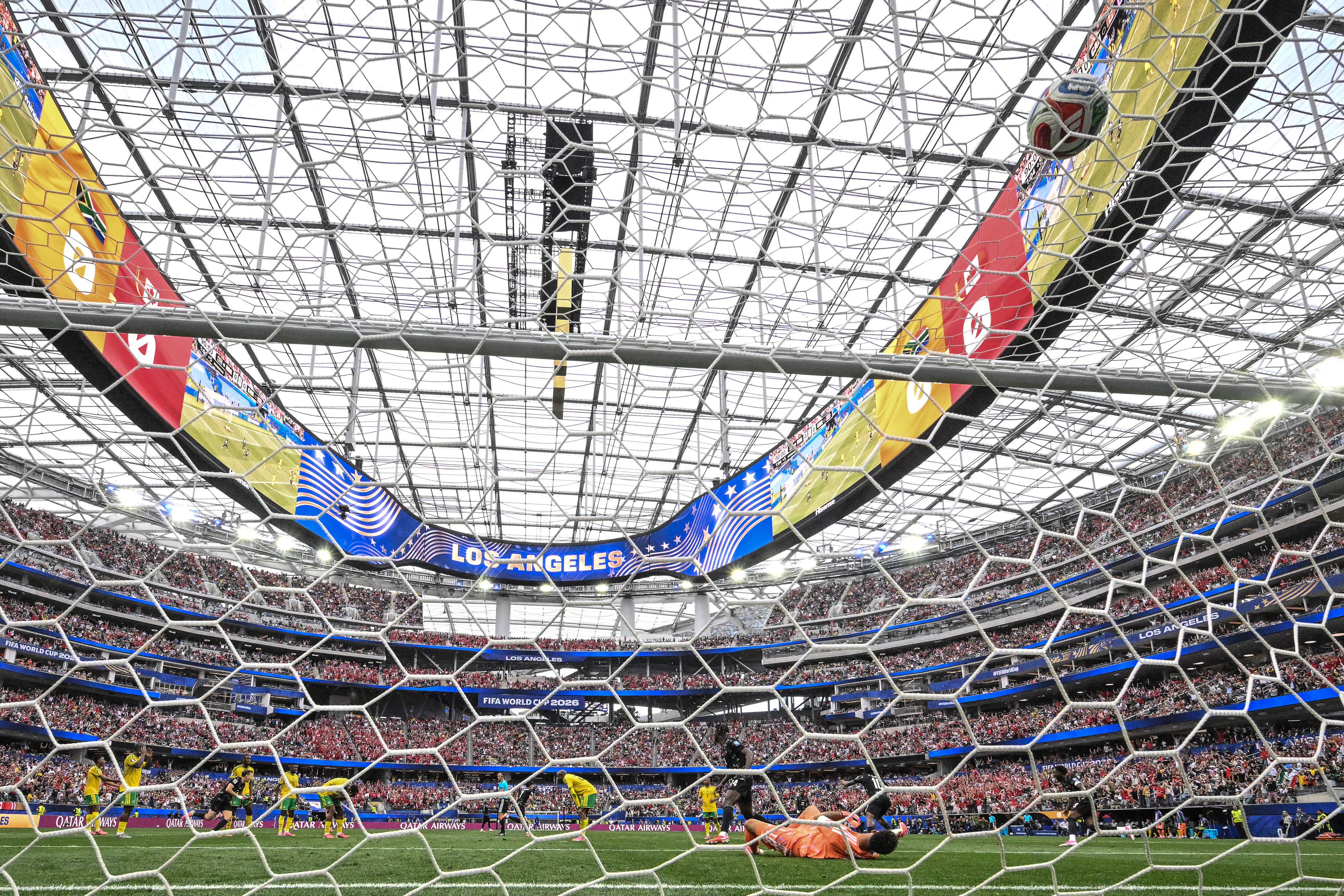 South Africa's goalkeeper #01 Ronwen Williams concedes Canada's first goal scored by midfielder #07 Stephen Eustaquio during the 2026 World Cup round of 32 football match between South Africa and Canada at the Los Angeles Stadium in Inglewood on June 28, 2026. (Photo by Patrick T. Fallon / AFP)