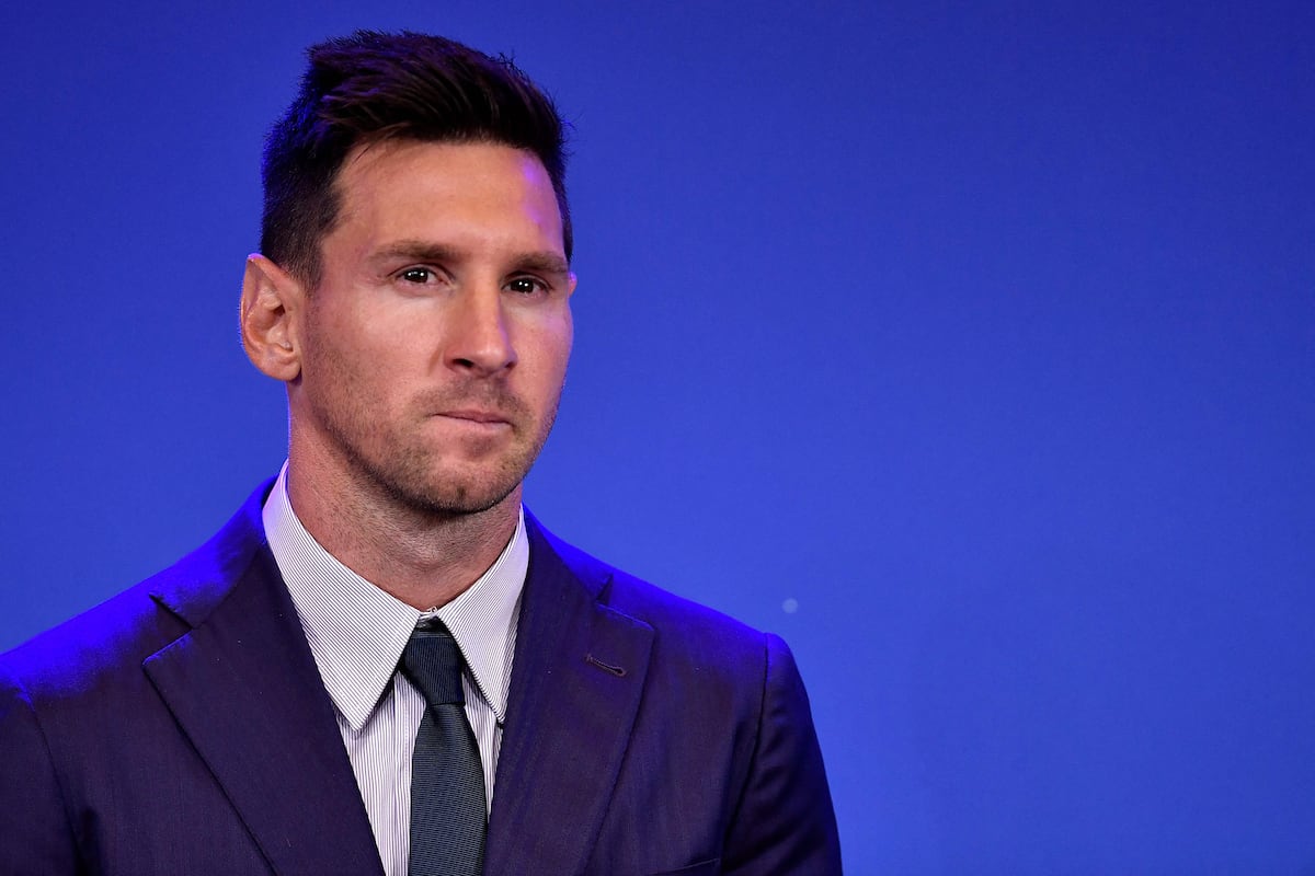 Barcelona's Argentinian forward Lionel Messi holds a press conference at the Camp Nou stadium in Barcelona on August 8, 2021. Messi fought back tears as he began a press conference at which he confirmed he is leaving Barcelona, where he has played his entire career. (Photo by Pau BARRENA / AFP)