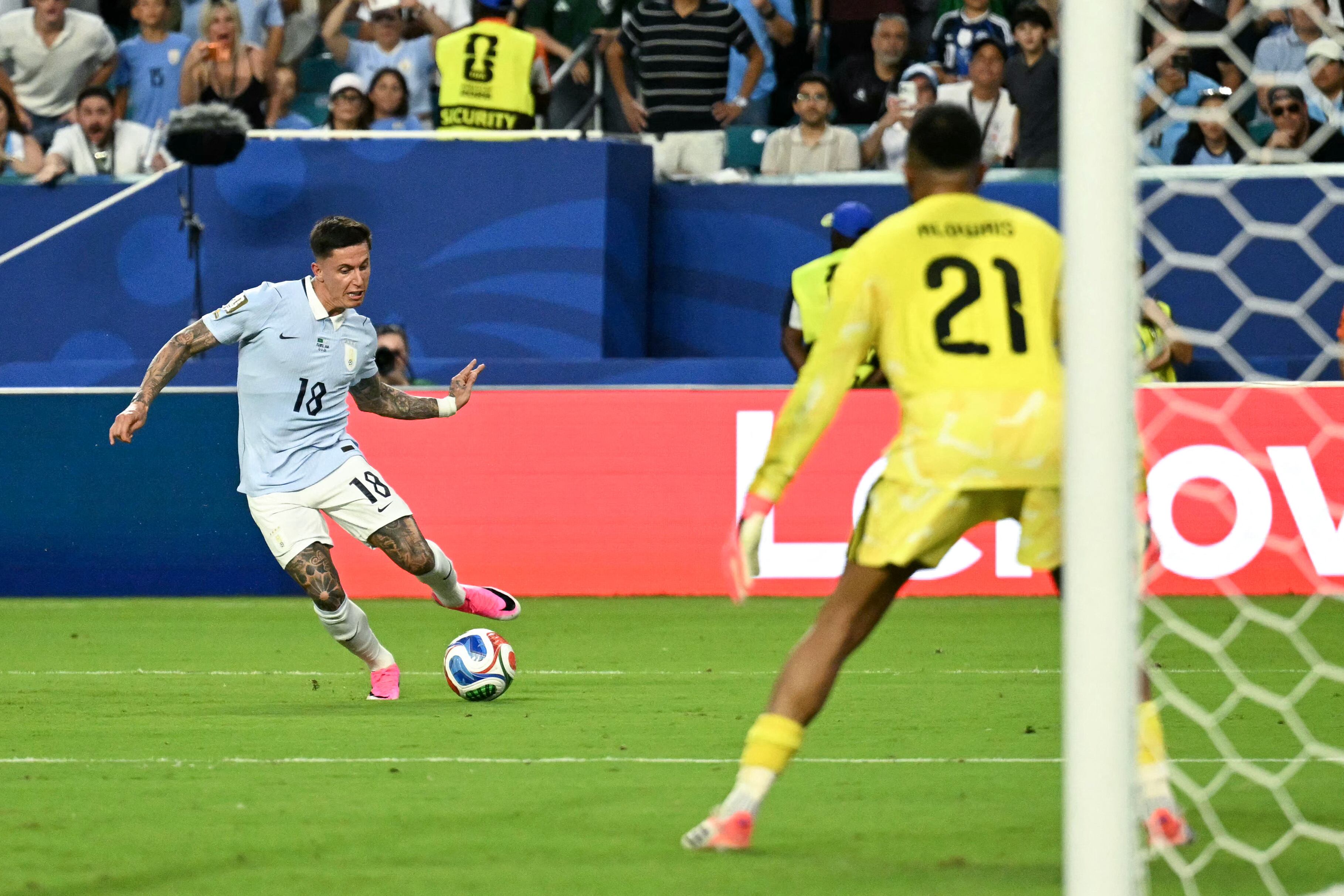 Uruguay's midfielder #18 Brian Rodriguez kicks the ball during the 2026 World Cup Group H football match between Saudi Arabia and Uruguay at the Miami Stadium in Miami Gardens on June 15, 2026. (Photo by CHANDAN KHANNA / AFP)