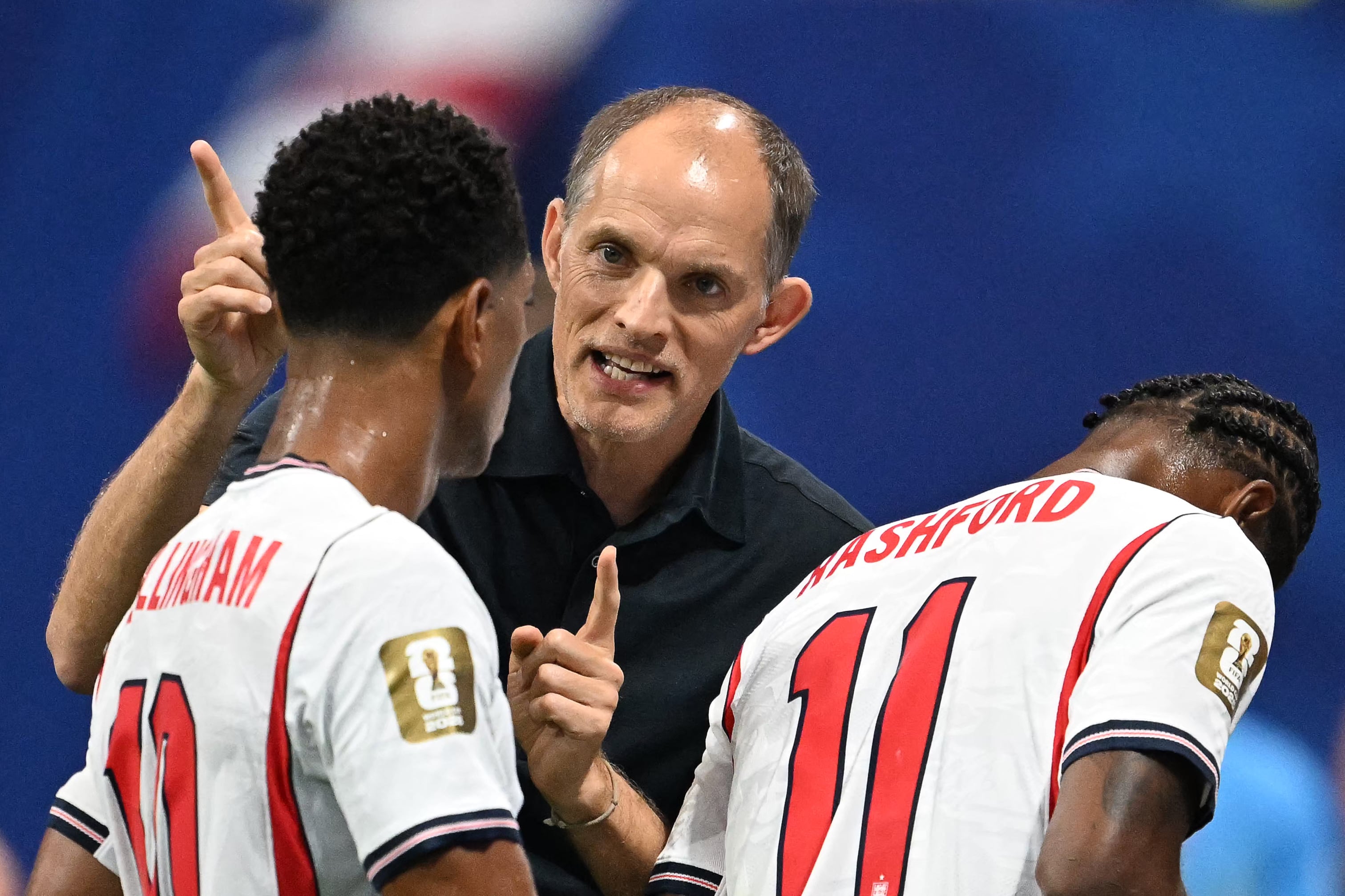 England's German head coach Thomas Tuchel gives instructions to England's midfielder #10 Jude Bellingham during the 2026 World Cup round of 32 match football between England and the Democratic Republic of Congo at the Atlanta Stadium in Atlanta on July 1, 2026. (Photo by ROBERTO SCHMIDT / AFP)