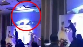 Novio muestra video de infidelidad de su pareja en plena boda (VIDEO)