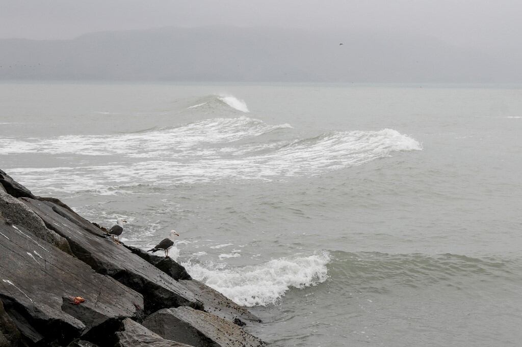Waves are seen during a tsunami warning on the coast of La Punta, Callao province, Peru on July 30, 2025. Peru closed 65 of its 121 Pacific ports as a tsunami alert was issued on July 30, 2025 following a massive 8.8-magnitude earthquake off the east coast of Russia. (Photo by Connie FRANCE / AFP)