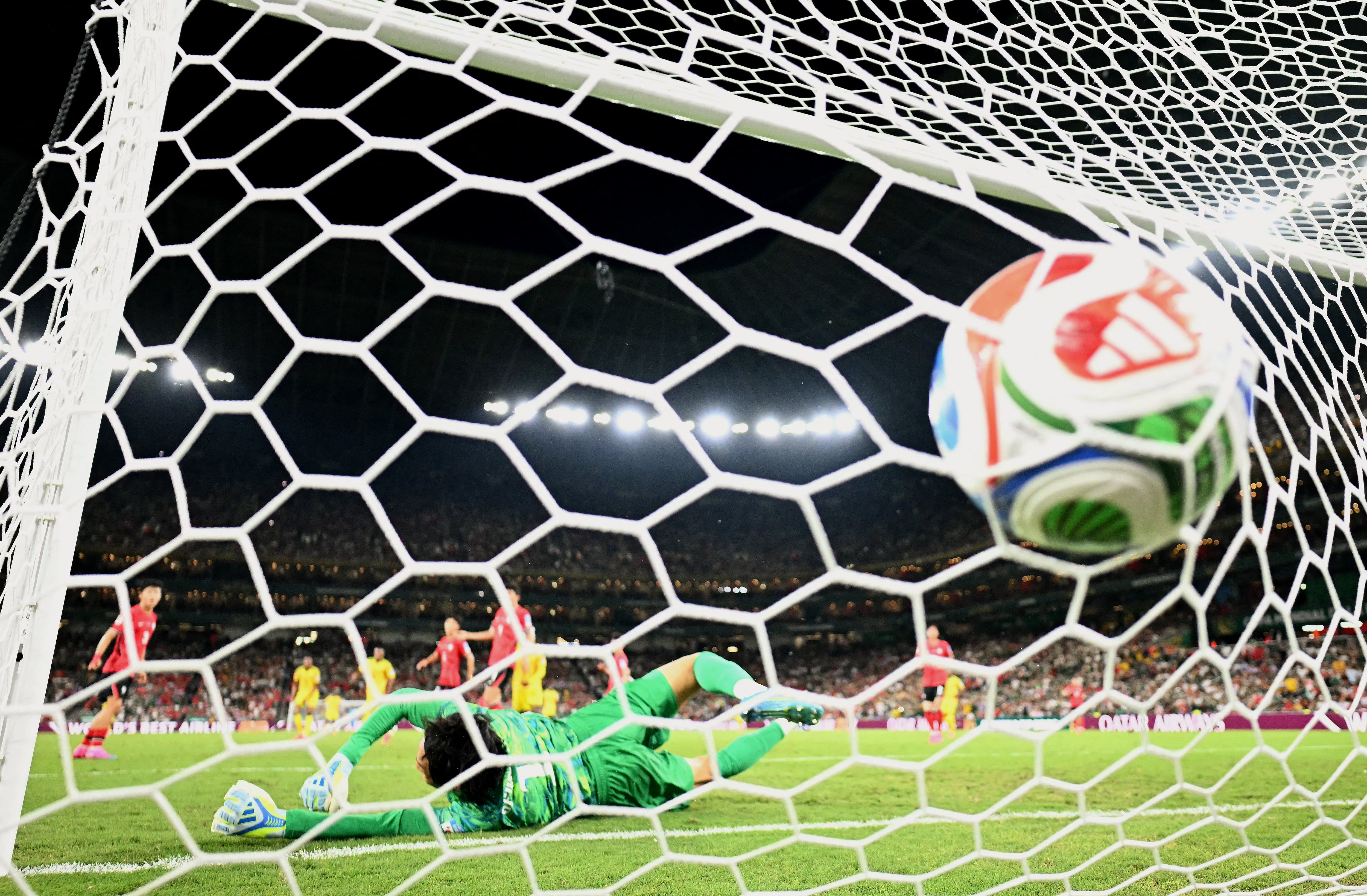 South Korea's goalkeeper #01 Kim Seung-gyu fails to save a goal scored by South Africa's forward #12 Thapelo Maseko (off frame) during the 2026 World Cup Group A football match between South Africa and South Korea at the Monterrey Stadium in Guadalupe, Mexico, on June 24, 2026. (Photo by YURI CORTEZ / AFP)