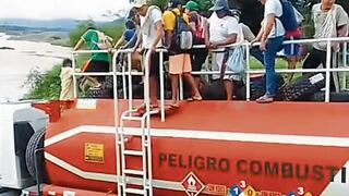 Piura: Ciudadanos pasan el río Serrán en cisterna