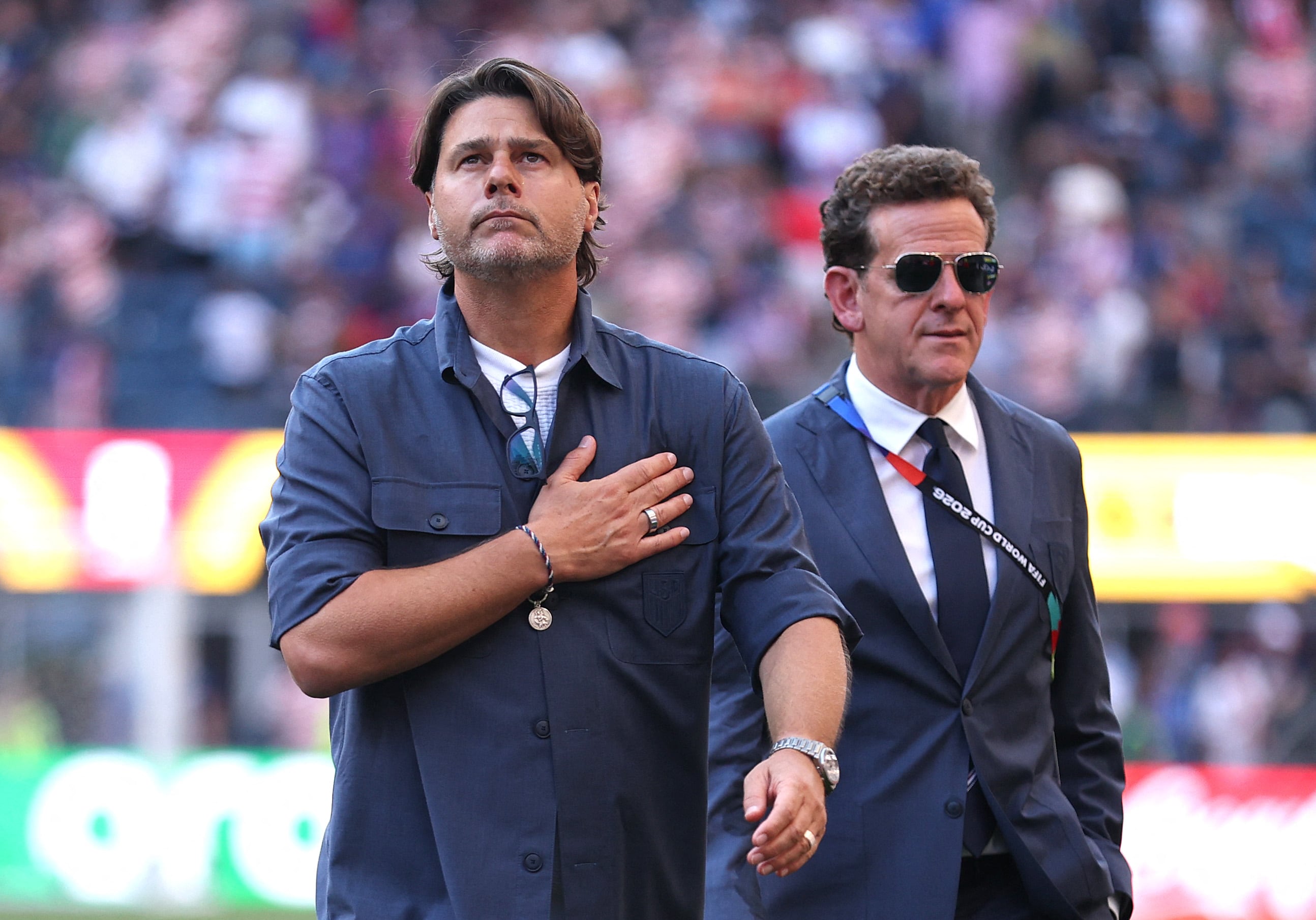 SEATTLE, WASHINGTON - JULY 06: Mauricio Pochettino, Head Coach of the United States, applauds fans after the 1-4 loss during the FIFA World Cup 2026 Round of 16 match between USA and Belgium at Seattle Stadium on July 06, 2026 in Seattle, Washington. Luke Hales/Getty Images/AFP (Photo by Luke Hales / GETTY IMAGES NORTH AMERICA / Getty Images via AFP)