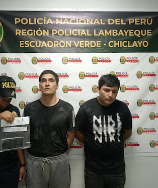 Sujetos detenidos por delito de robo agravado.