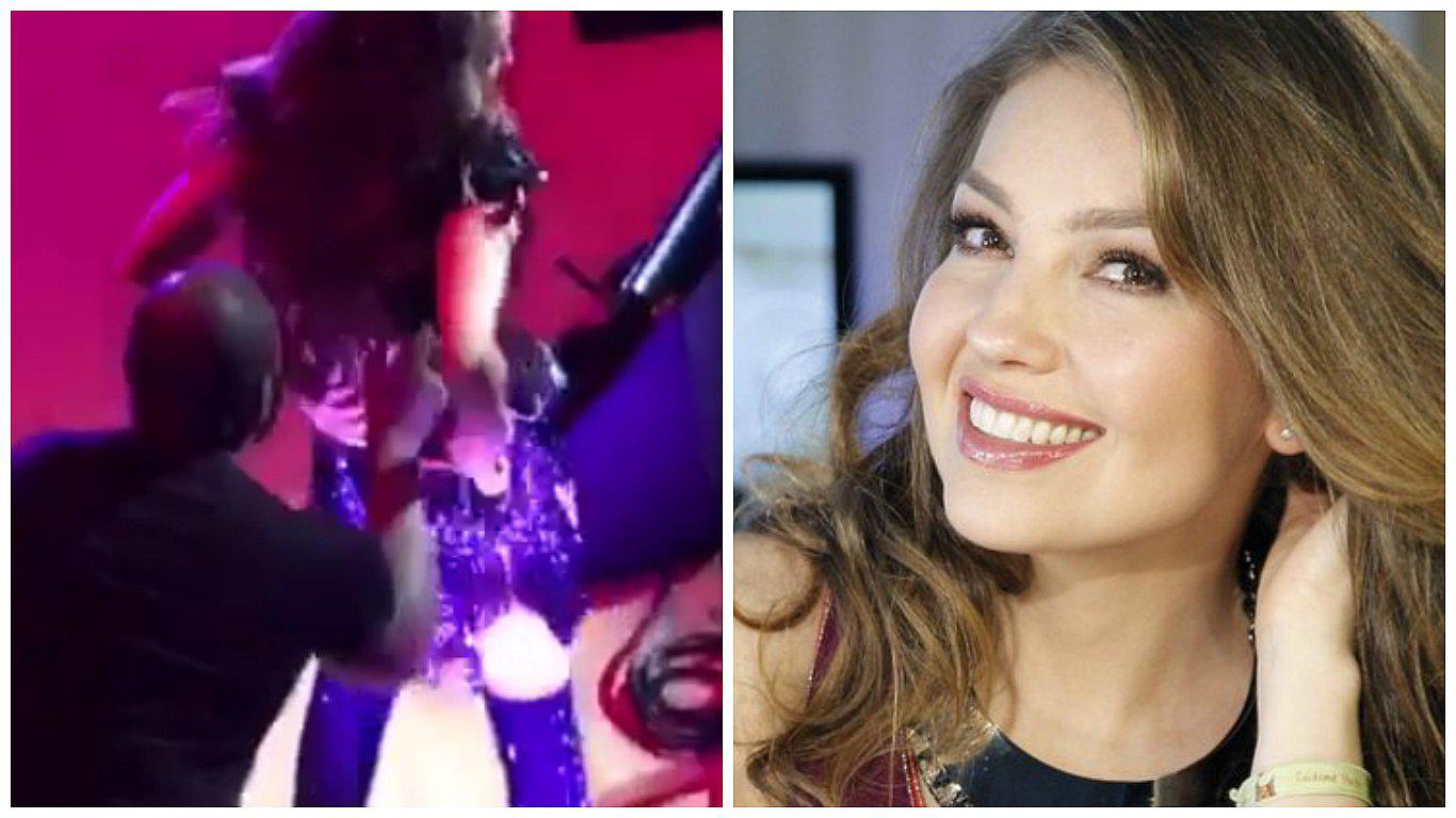 ​Thalía pasa bochornoso momento por su vestido durante concierto (VIDEO)