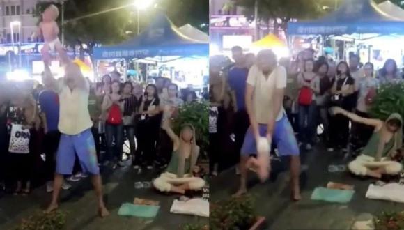 Pareja es detenida por zarandear a su bebé en actuación de calle en Malasia (VIDEO)